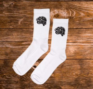 Weiße Tennissocken mit aufgesticktem PsychOlympia-Logo